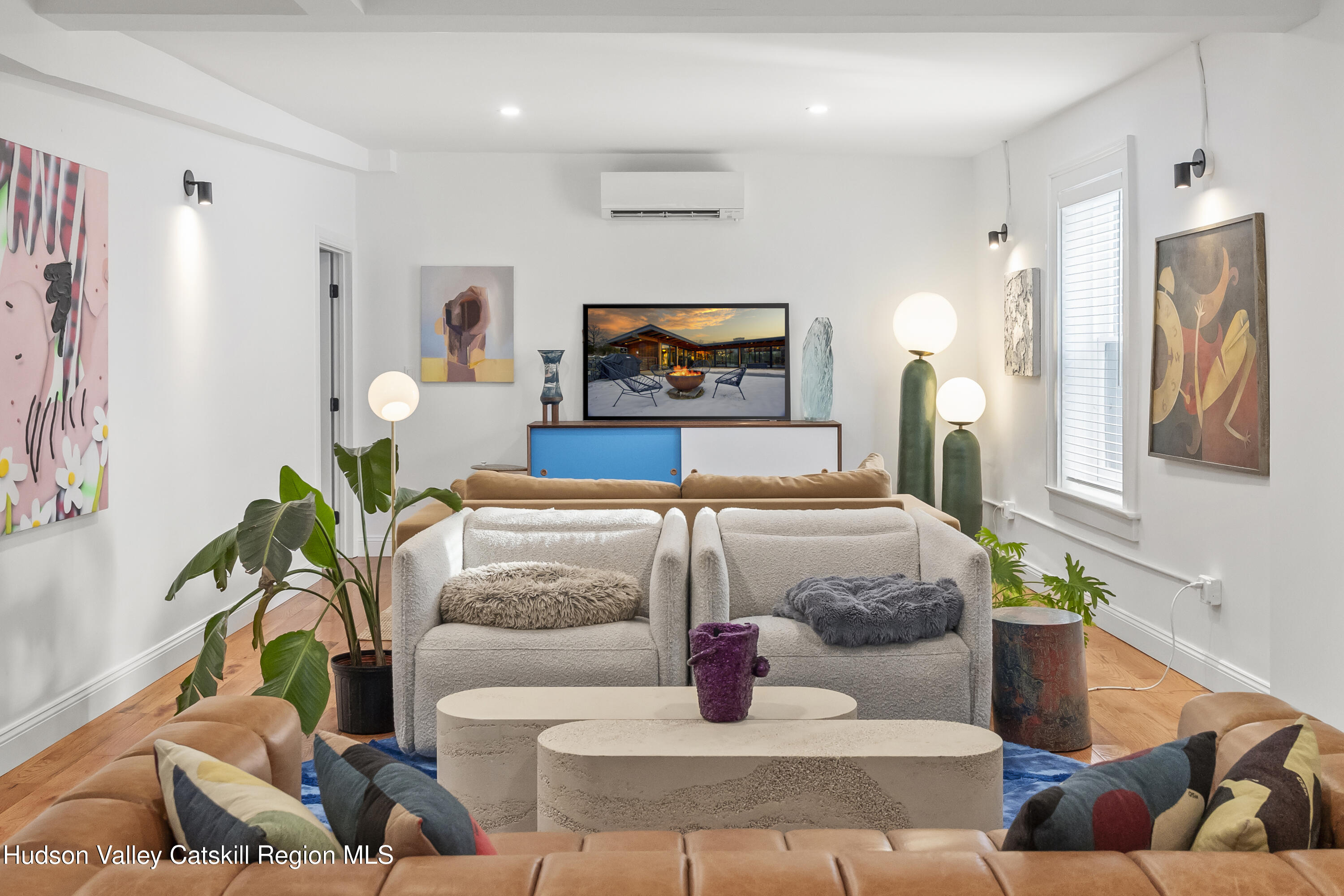 417 Warren Street, Unit A Hudson, NY 12534 - Photo 2 of 19 a living room with furniture and a painting