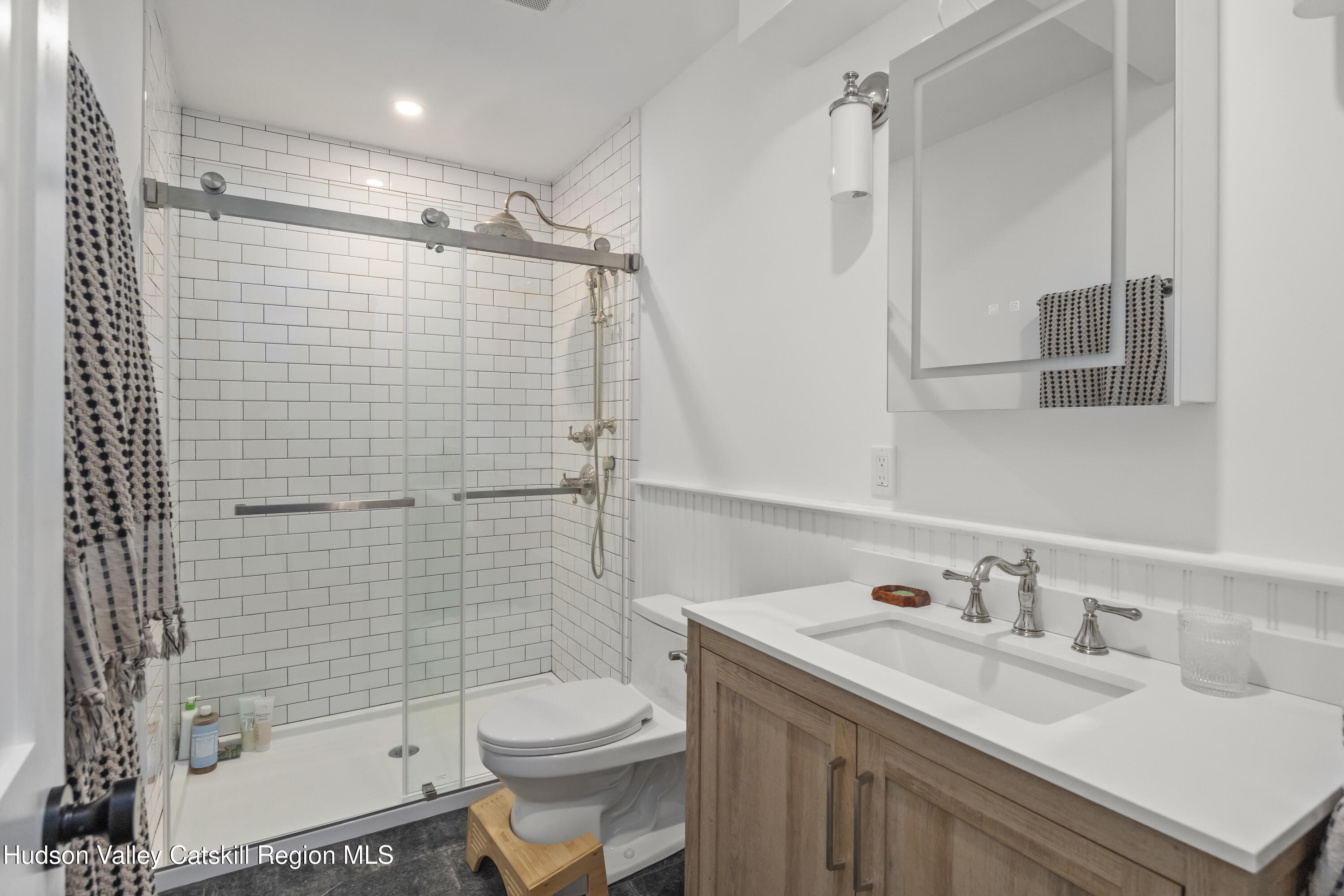 417 Warren Street, Unit A Hudson, NY 12534 - Photo 10 of 19 a bathroom with a sink toilet and shower