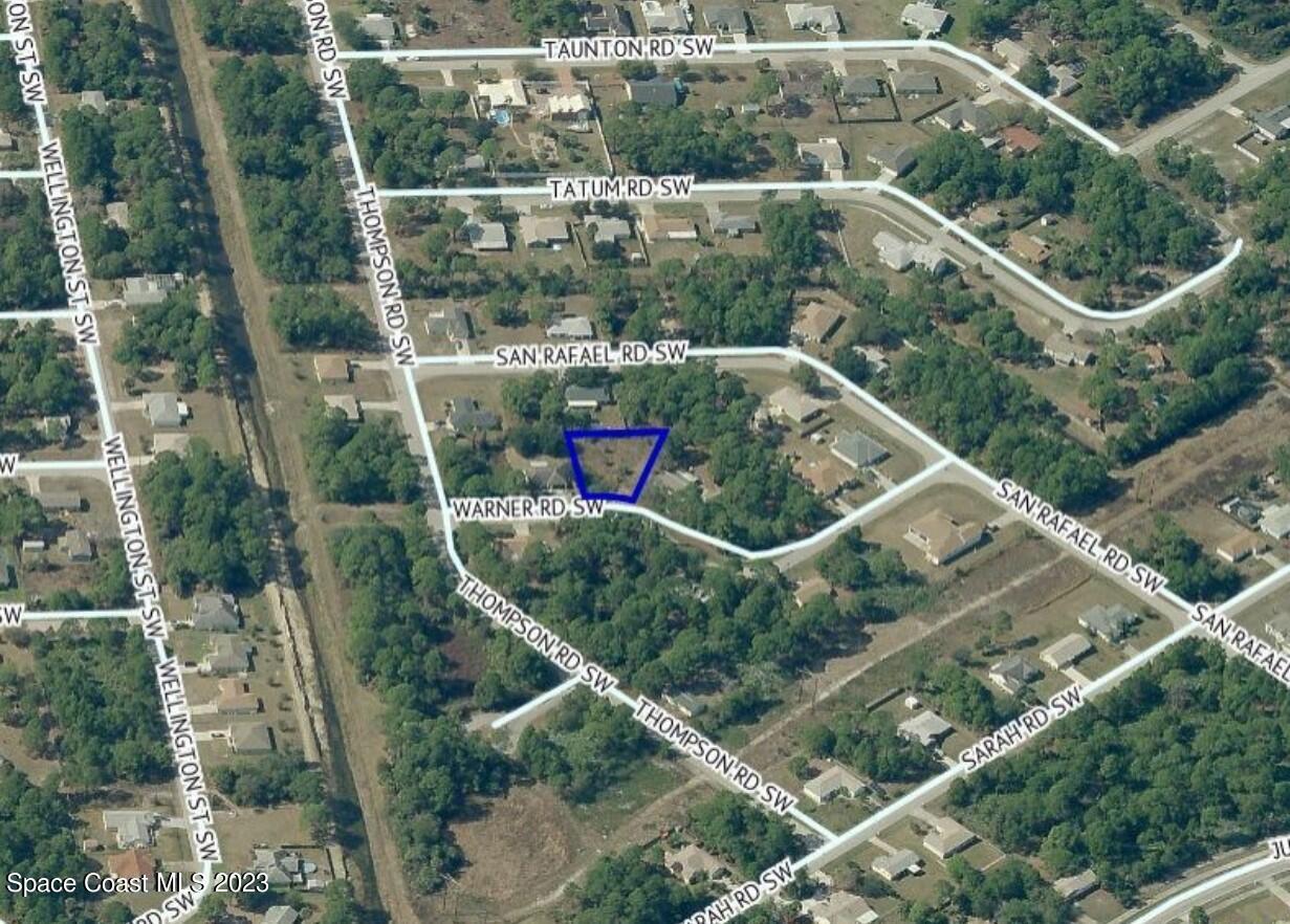 378 Warner Road Southwest Palm Bay, FL 32908 - Photo 3 of 9 an aerial view of a house