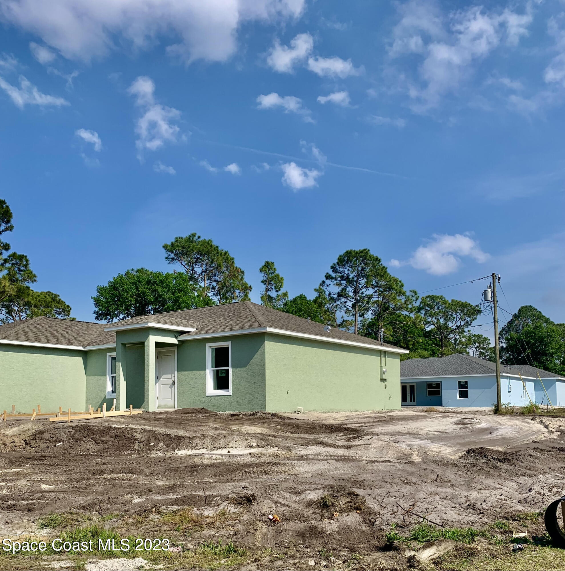 378 Warner Road Southwest Palm Bay, FL 32908 - Photo 9 of 9 a view of a house with a yard