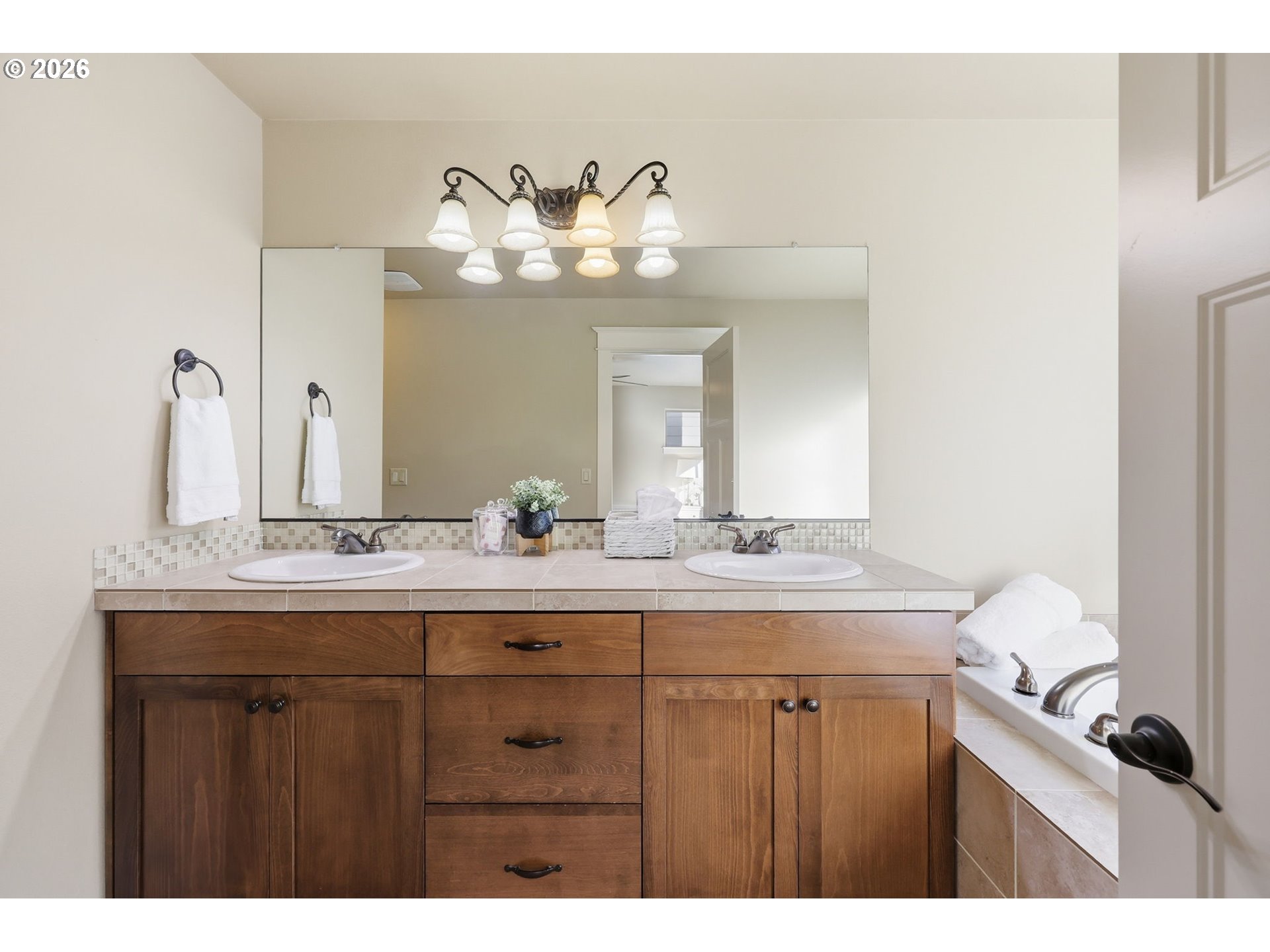 11033 Southwest Legacy Oak Way Portland, OR 97223 - Photo 19 of 47 a bathroom with a sink and a mirror