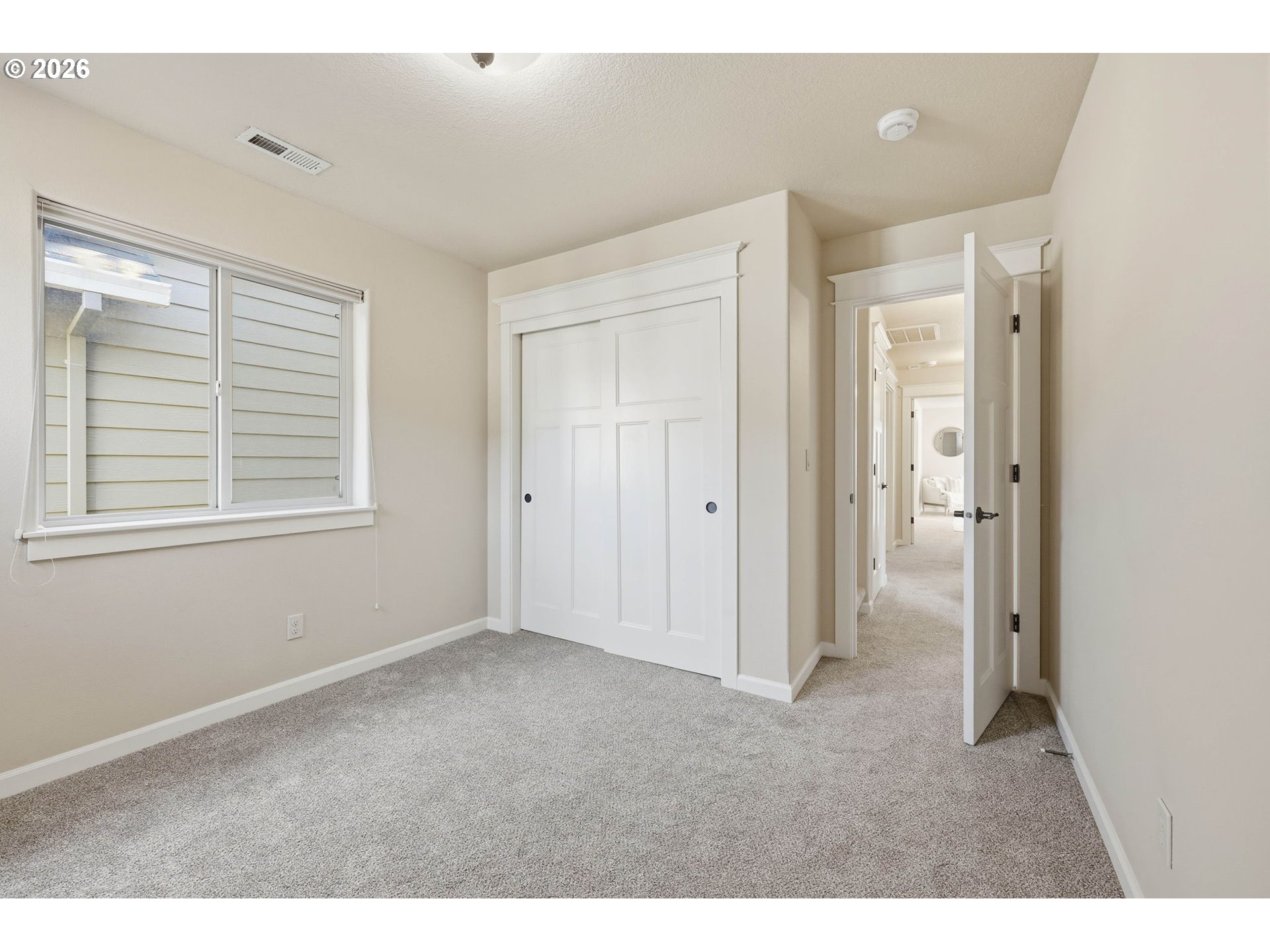 11033 Southwest Legacy Oak Way Portland, OR 97223 - Photo 30 of 47 a view of an empty room with a window