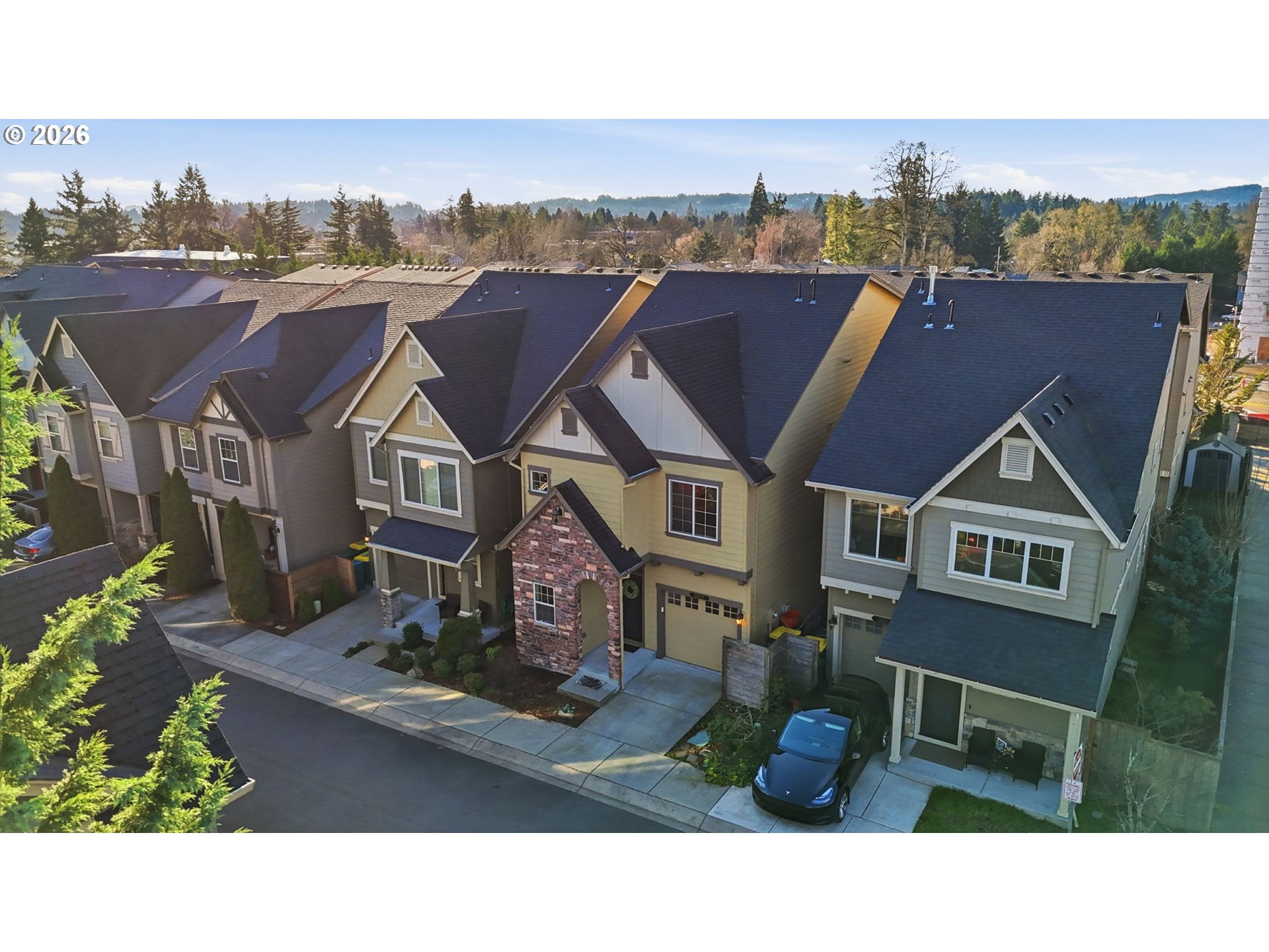 11033 Southwest Legacy Oak Way Portland, OR 97223 - Photo 41 of 47 a aerial view of a town with many windows