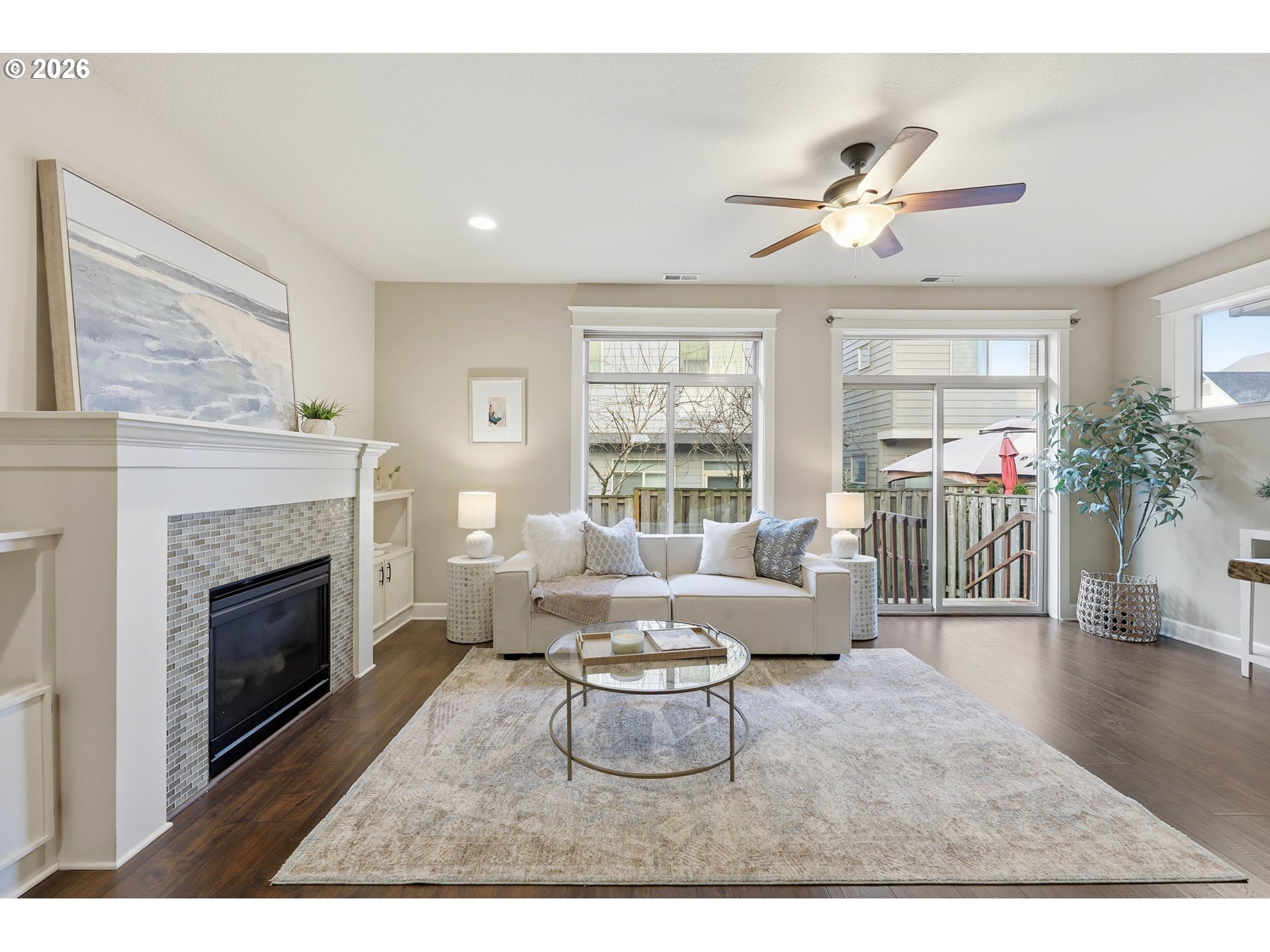 11033 Southwest Legacy Oak Way Portland, OR 97223 - Photo 6 of 47 a living room with furniture and a fireplace