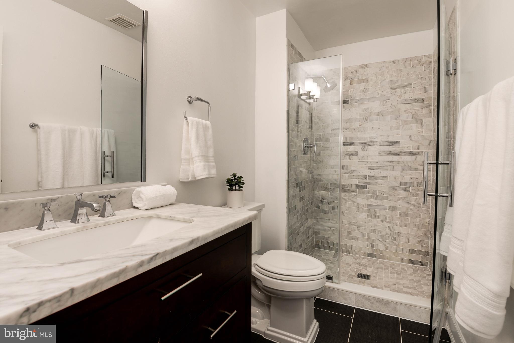 11396 Fairway Drive Reston, VA 20190 - Photo 20 of 45 Master Bath- framelss enclosure and newer tile.