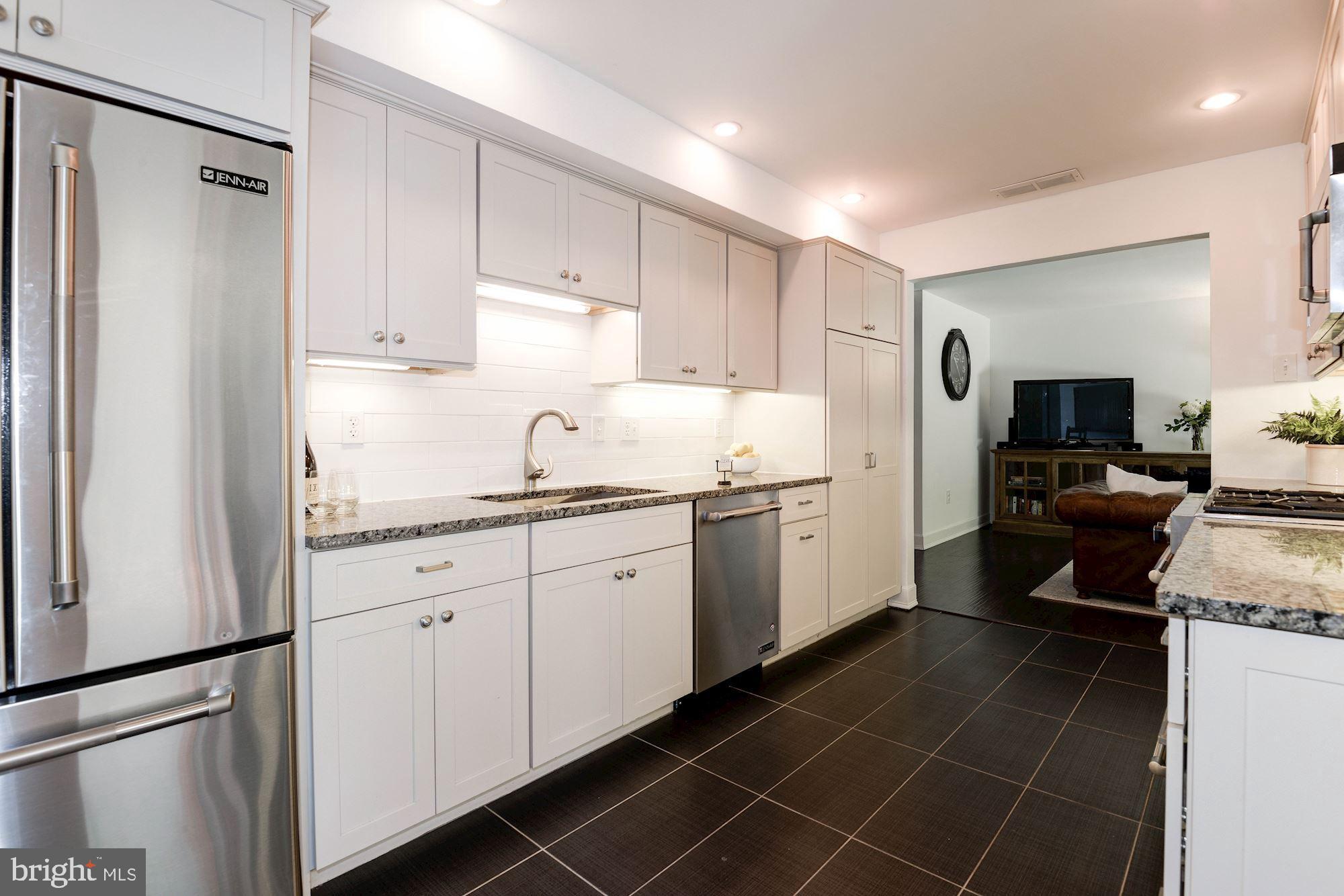 11396 Fairway Drive Reston, VA 20190 - Photo 4 of 45 White shaker gourmet kitchen
