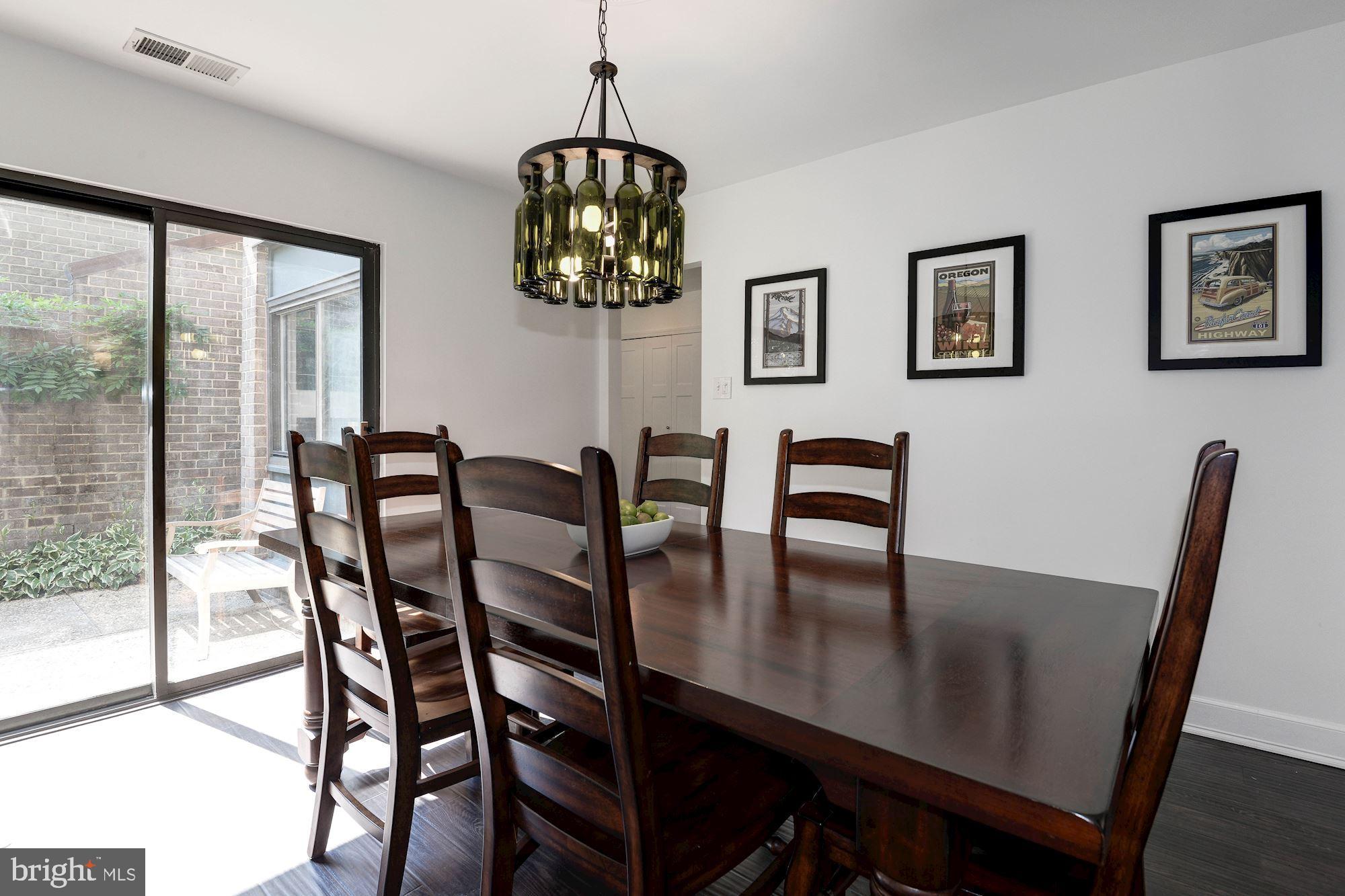 11396 Fairway Drive Reston, VA 20190 - Photo 9 of 45 Large dining room with awesome light fixture