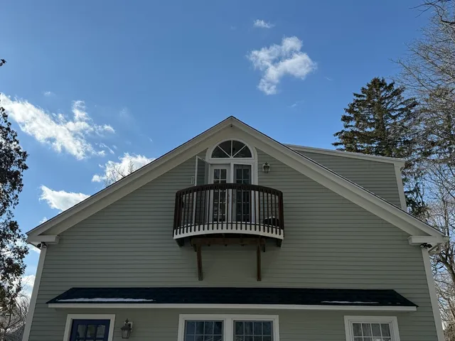 a view of a house with a snow