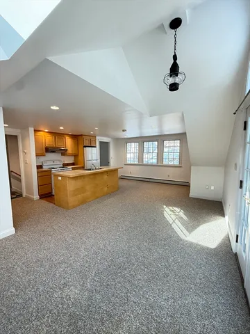 a view of kitchen and natural light