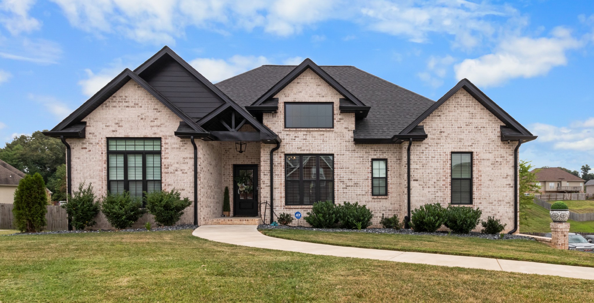 1188 Wicke Road Adams, TN 37010 - Photo 1 of 47 a front view of a house with a yard