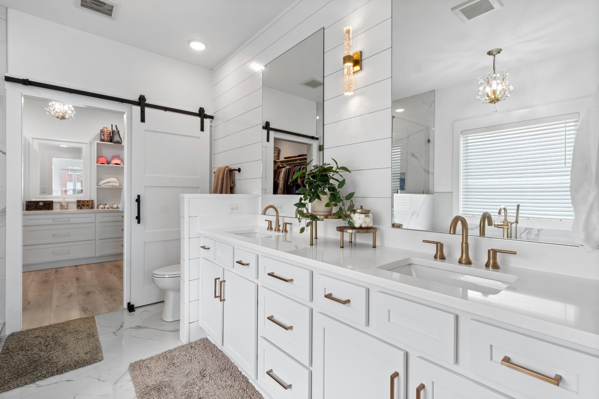 1188 Wicke Road Adams, TN 37010 - Photo 21 of 47 a bathroom with double vanity sink and a mirror