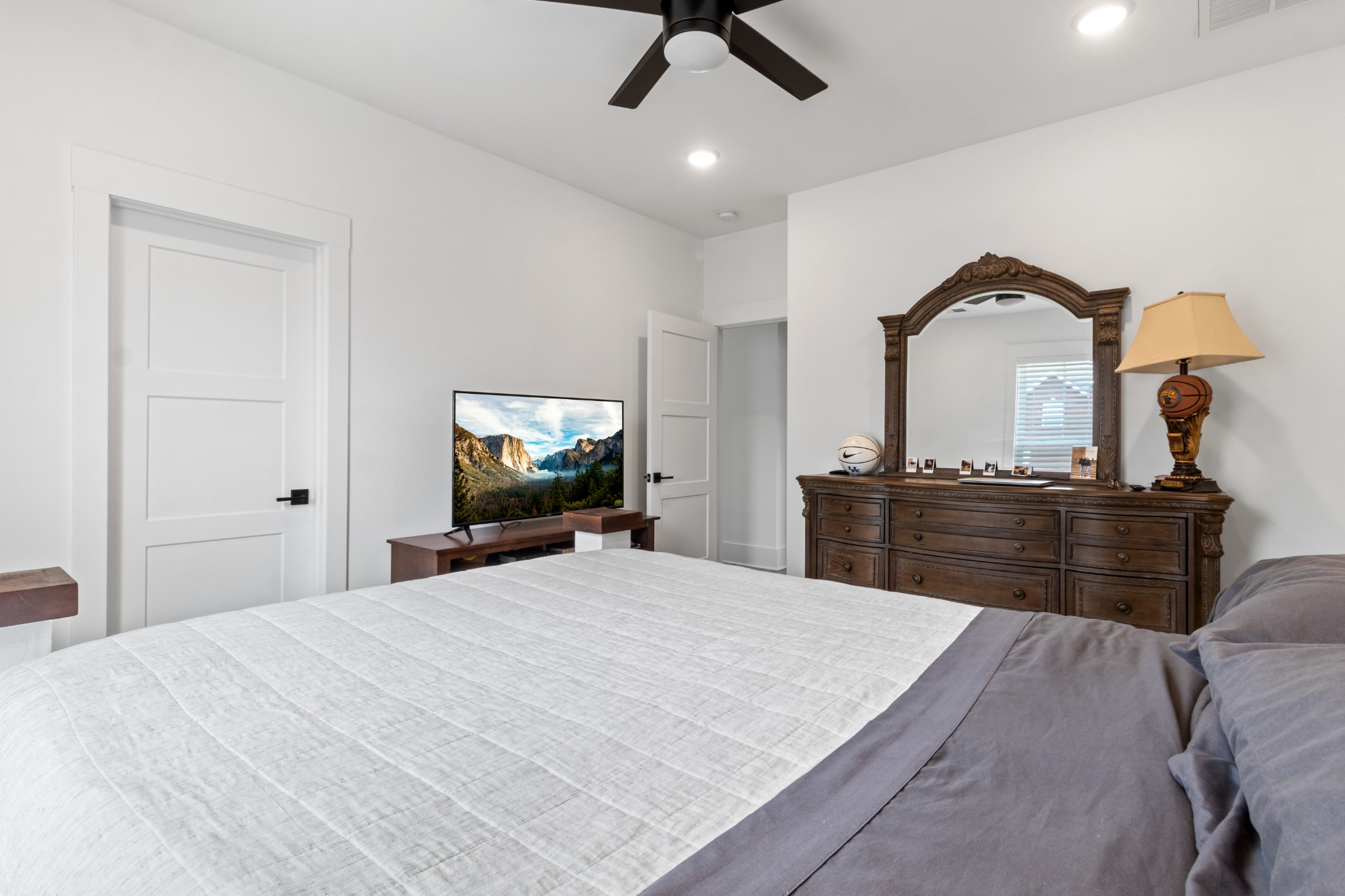 1188 Wicke Road Adams, TN 37010 - Photo 27 of 47 a bedroom with a bed and a television