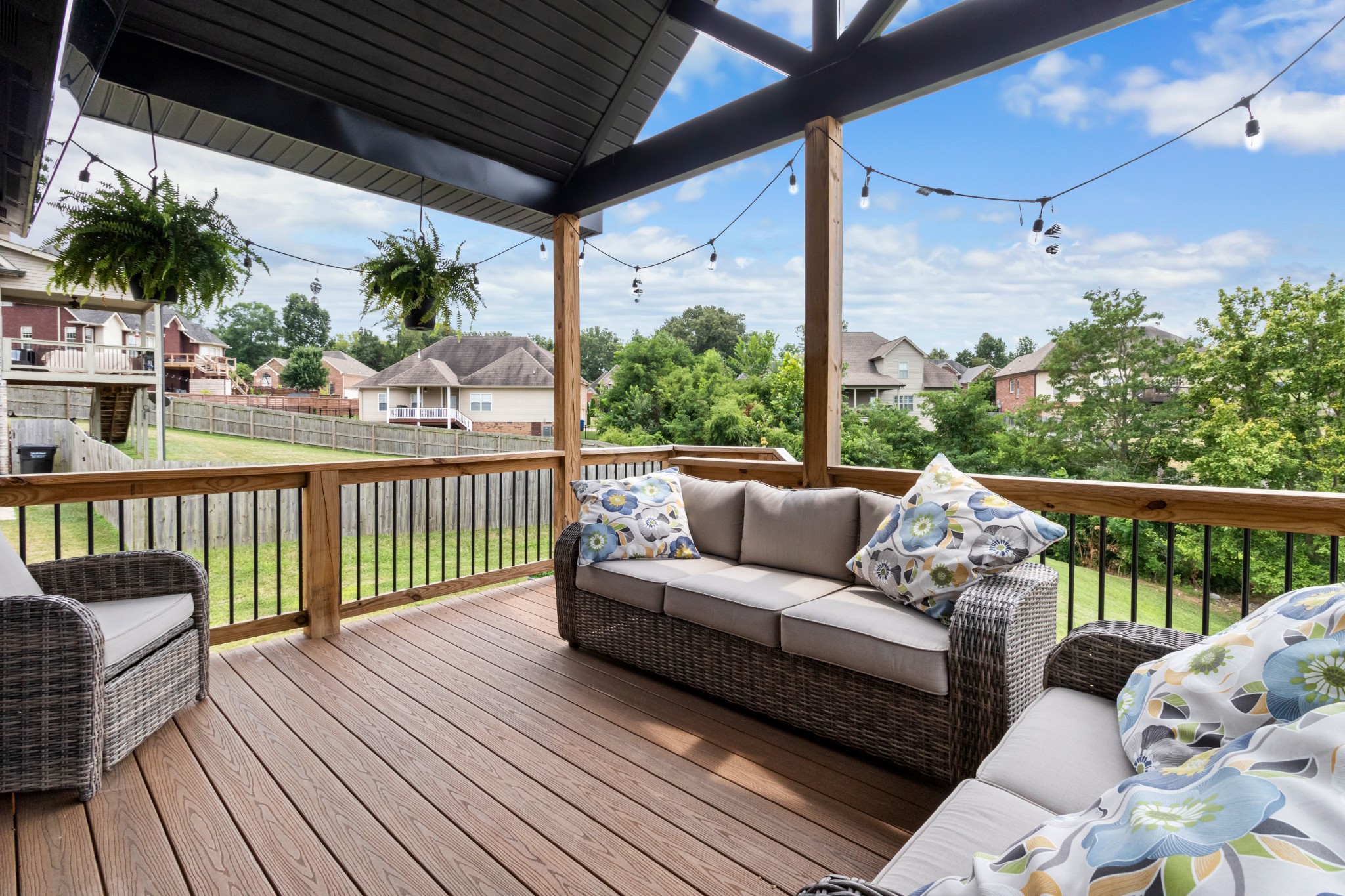 1188 Wicke Road Adams, TN 37010 - Photo 38 of 47 a balcony with furniture and a potted plant