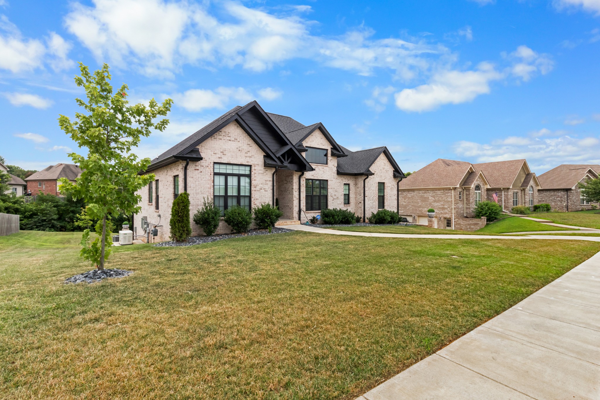 1188 Wicke Road Adams, TN 37010 - Photo 47 of 47 a front view of a house with a garden and yard