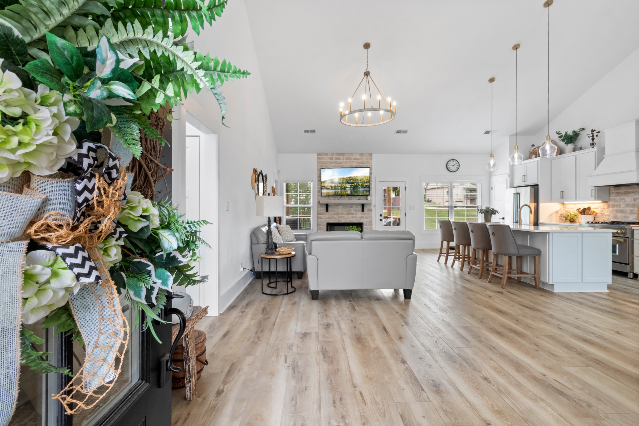 1188 Wicke Road Adams, TN 37010 - Photo 5 of 47 a view of a dining room with furniture wooden floor and chandelier