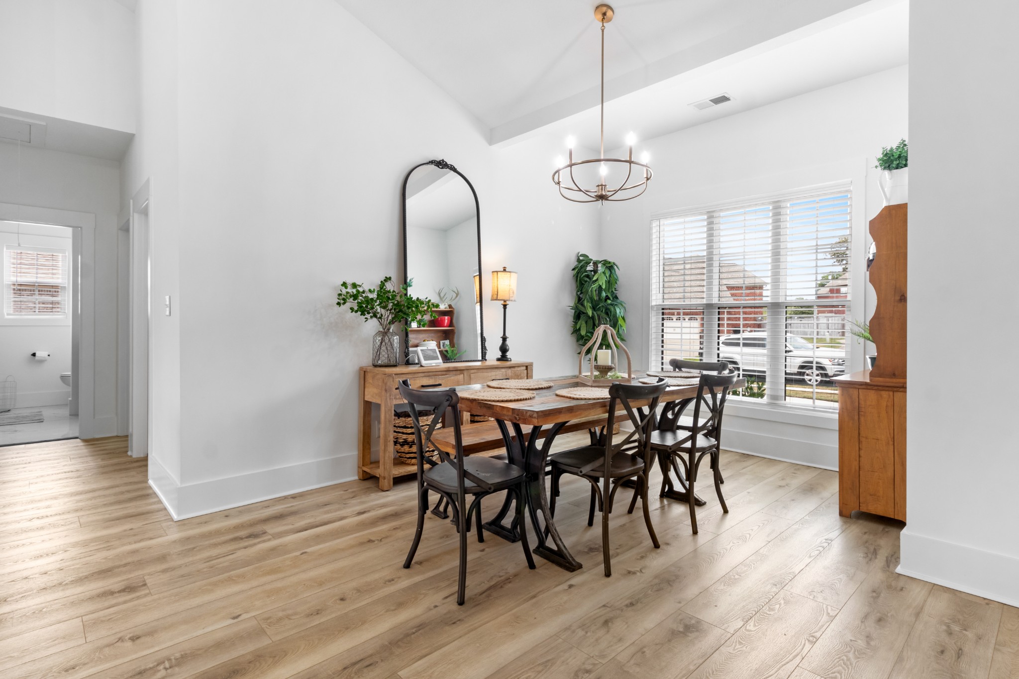 1188 Wicke Road Adams, TN 37010 - Photo 6 of 47 a view of a dining room with furniture window and wooden floor
