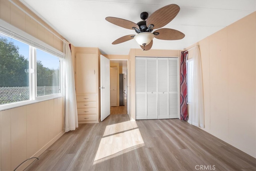 2300 Cienaga Street, Unit 36 Oceano, CA 93445 - Photo 19 of 39 a view of a livingroom with a ceiling fan and window