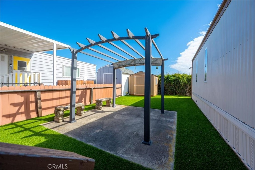 2300 Cienaga Street, Unit 36 Oceano, CA 93445 - Photo 27 of 39 a view of a house with a yard and porch