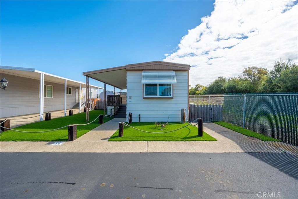 2300 Cienaga Street, Unit 36 Oceano, CA 93445 - Photo 3 of 39 a front view of a house with garden