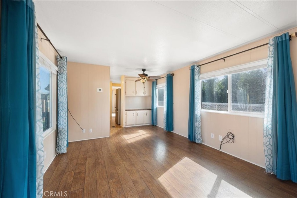 2300 Cienaga Street, Unit 36 Oceano, CA 93445 - Photo 9 of 39 a view of a big room with wooden floor and windows
