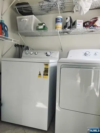 a utility room with a washer and dryer