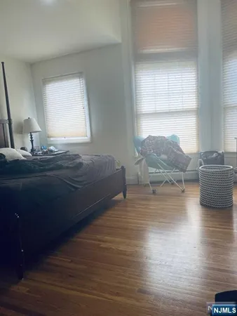 a room with a bed and a window