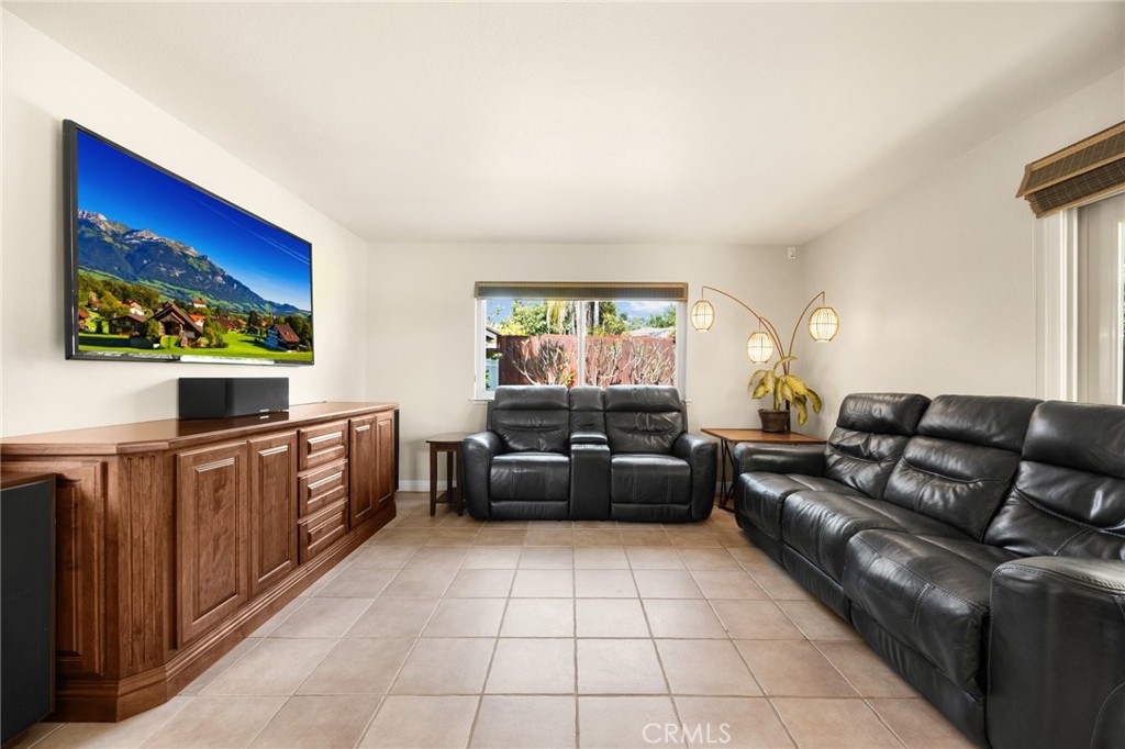 1412 Alta Mesa Way Brea, CA 92821 - Photo 15 of 50 a living room with furniture and a flat screen tv