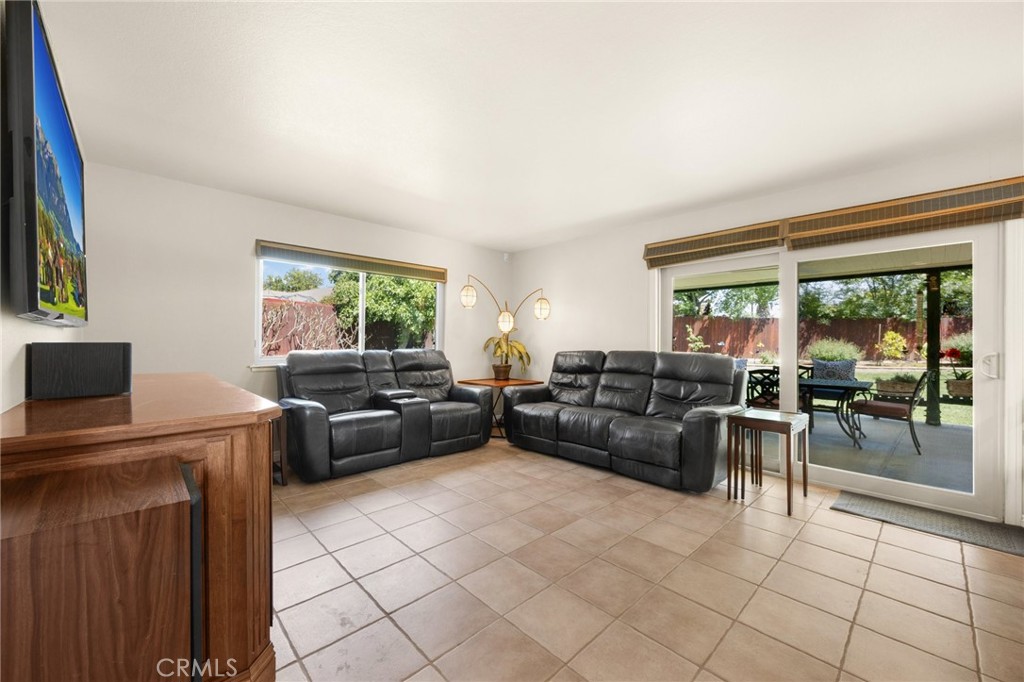 1412 Alta Mesa Way Brea, CA 92821 - Photo 16 of 50 a living room with furniture and a flat screen tv