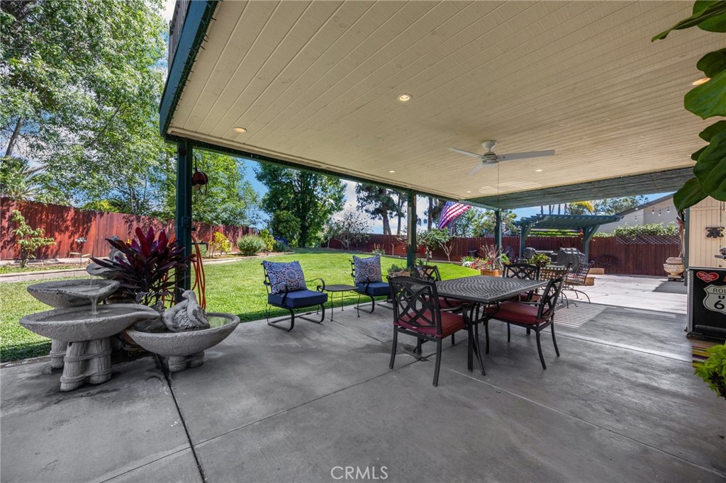 1412 Alta Mesa Way Brea, CA 92821 - Photo 21 of 50 a view of a patio with a dining table and chairs