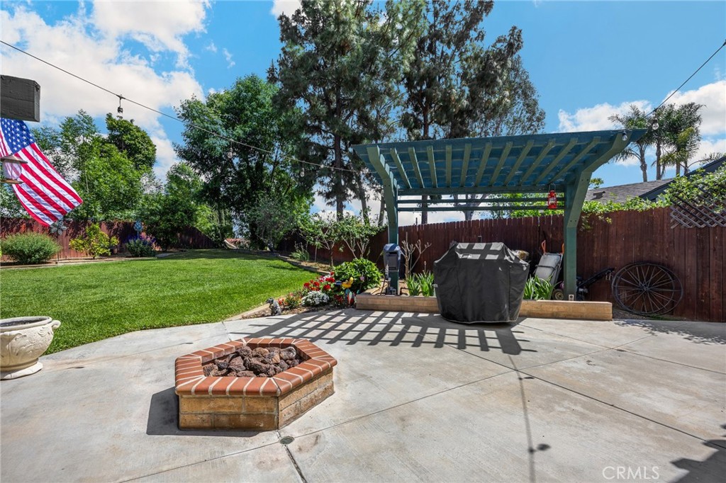 1412 Alta Mesa Way Brea, CA 92821 - Photo 24 of 50 a view of a table and chairs in backyard of the house