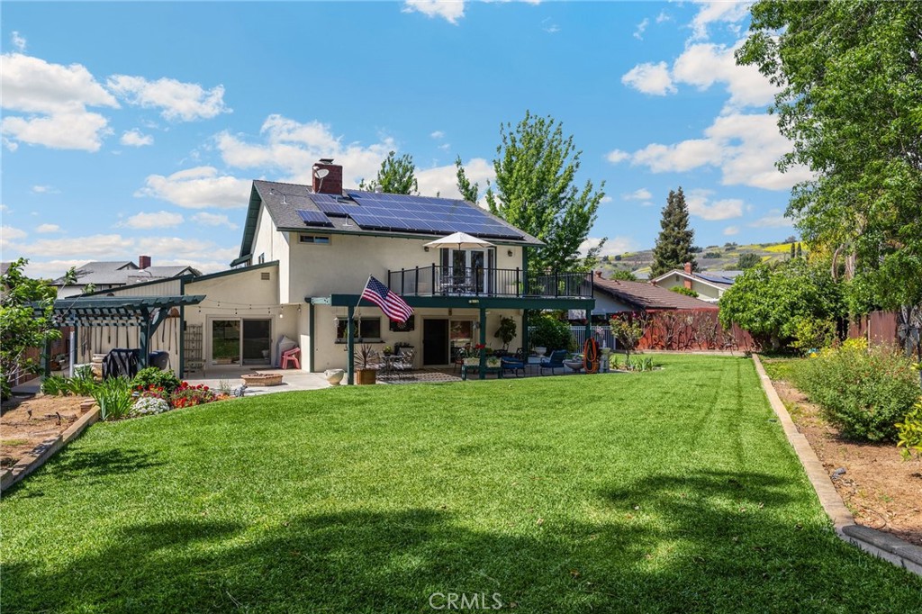 1412 Alta Mesa Way Brea, CA 92821 - Photo 25 of 50 a view of a house with a big yard and potted plants