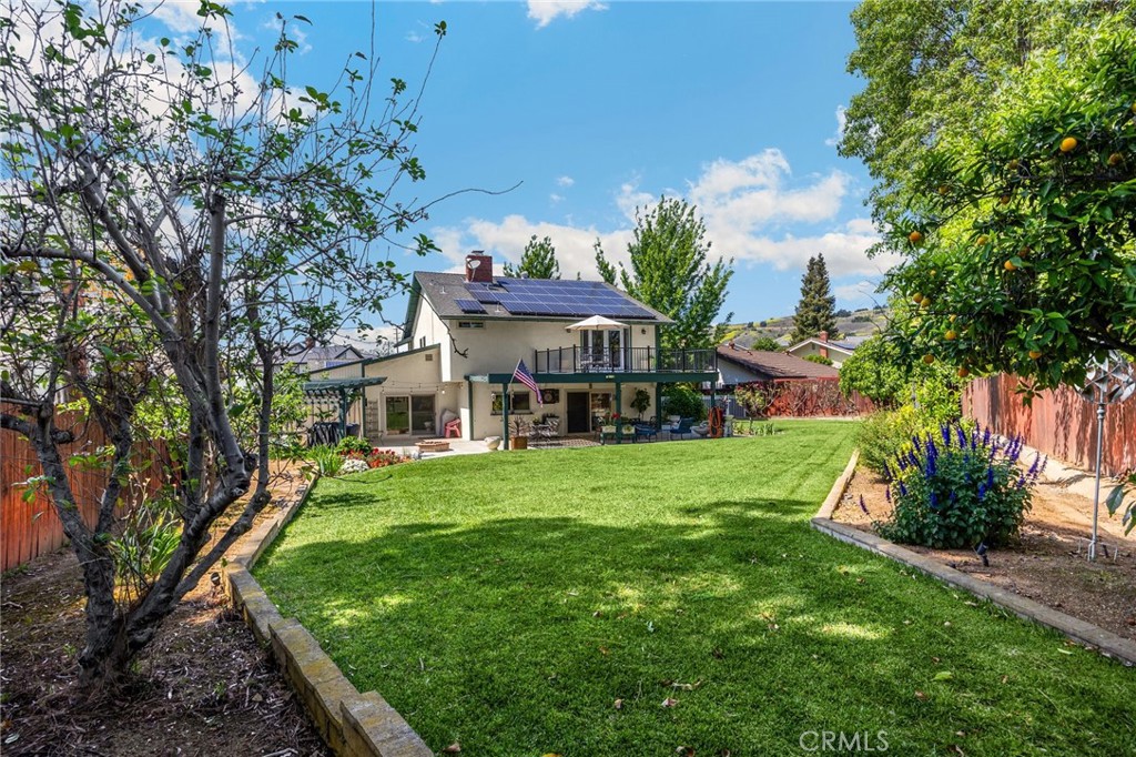 1412 Alta Mesa Way Brea, CA 92821 - Photo 27 of 50 a front view of a house with a yard table and chairs