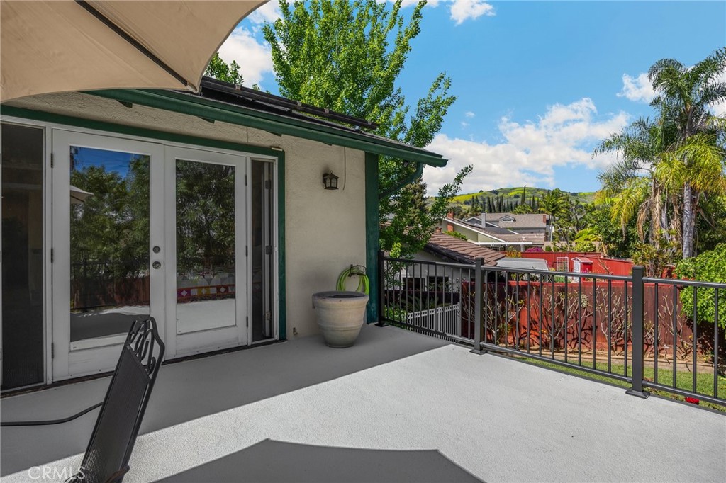 1412 Alta Mesa Way Brea, CA 92821 - Photo 39 of 50 a view of a balcony with chair and the potted plant