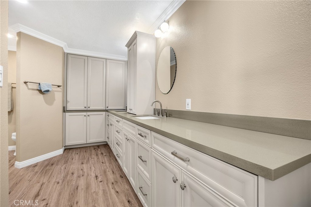 1412 Alta Mesa Way Brea, CA 92821 - Photo 43 of 50 a spacious bathroom with a double vanity sink and a mirror