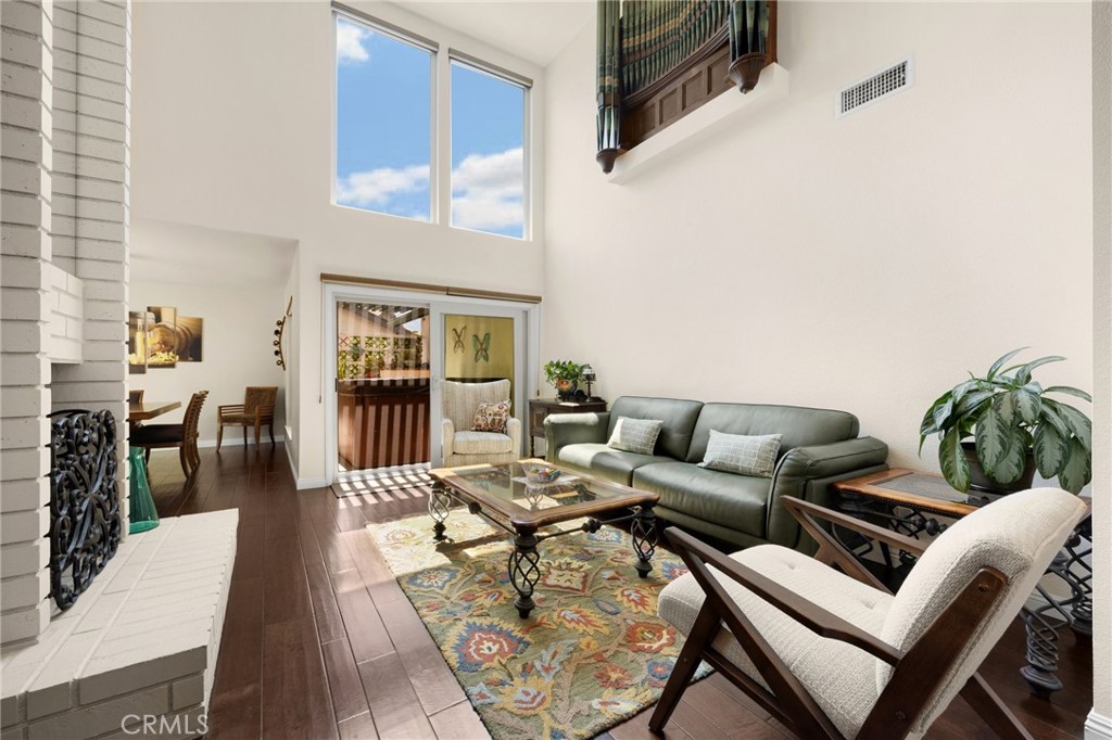 1412 Alta Mesa Way Brea, CA 92821 - Photo 10 of 50 a living room with furniture and a fireplace