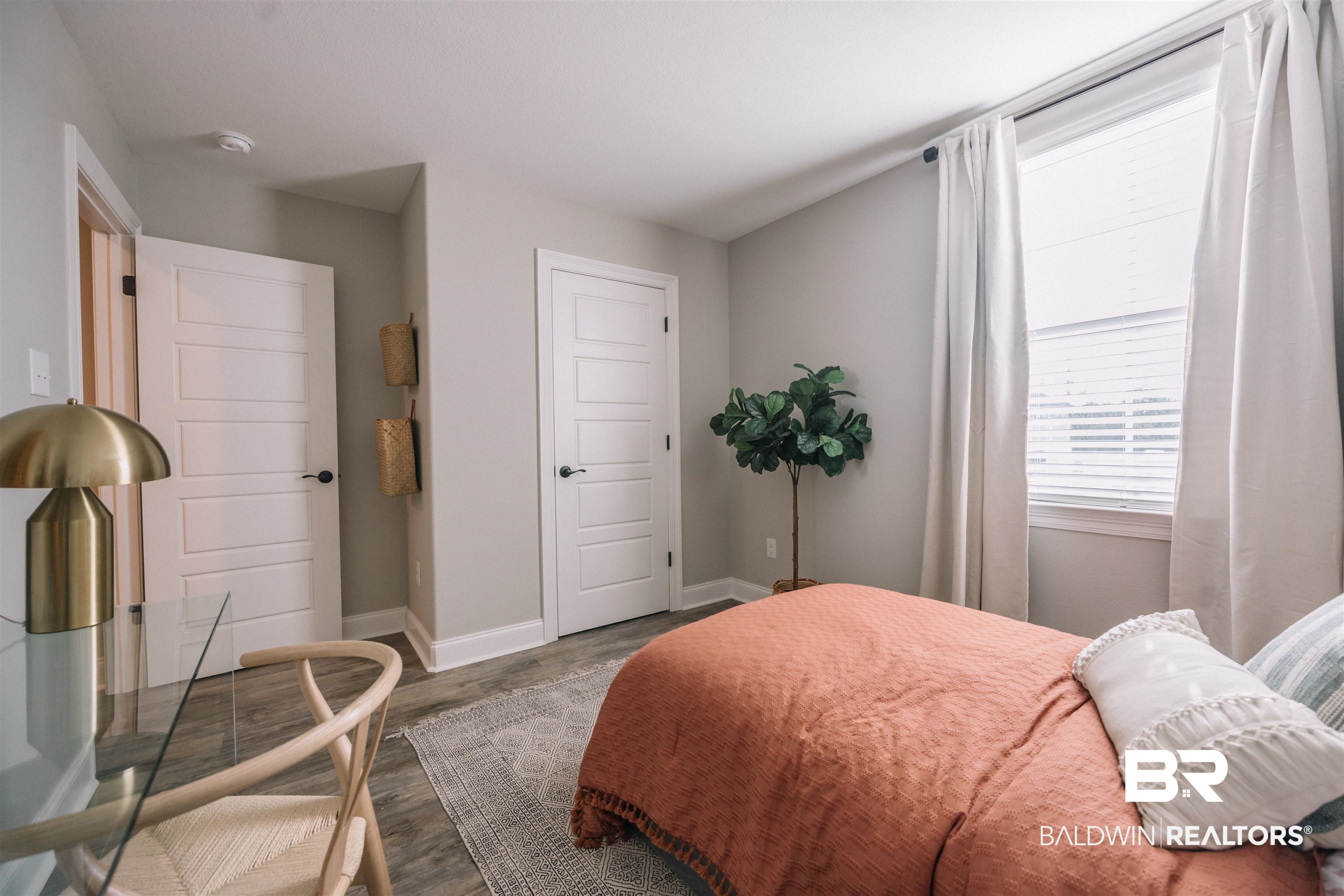 12894 Flanagan Street Elberta, AL 36530 - Photo 18 of 29 Bedroom featuring hardwood / wood-style flooring