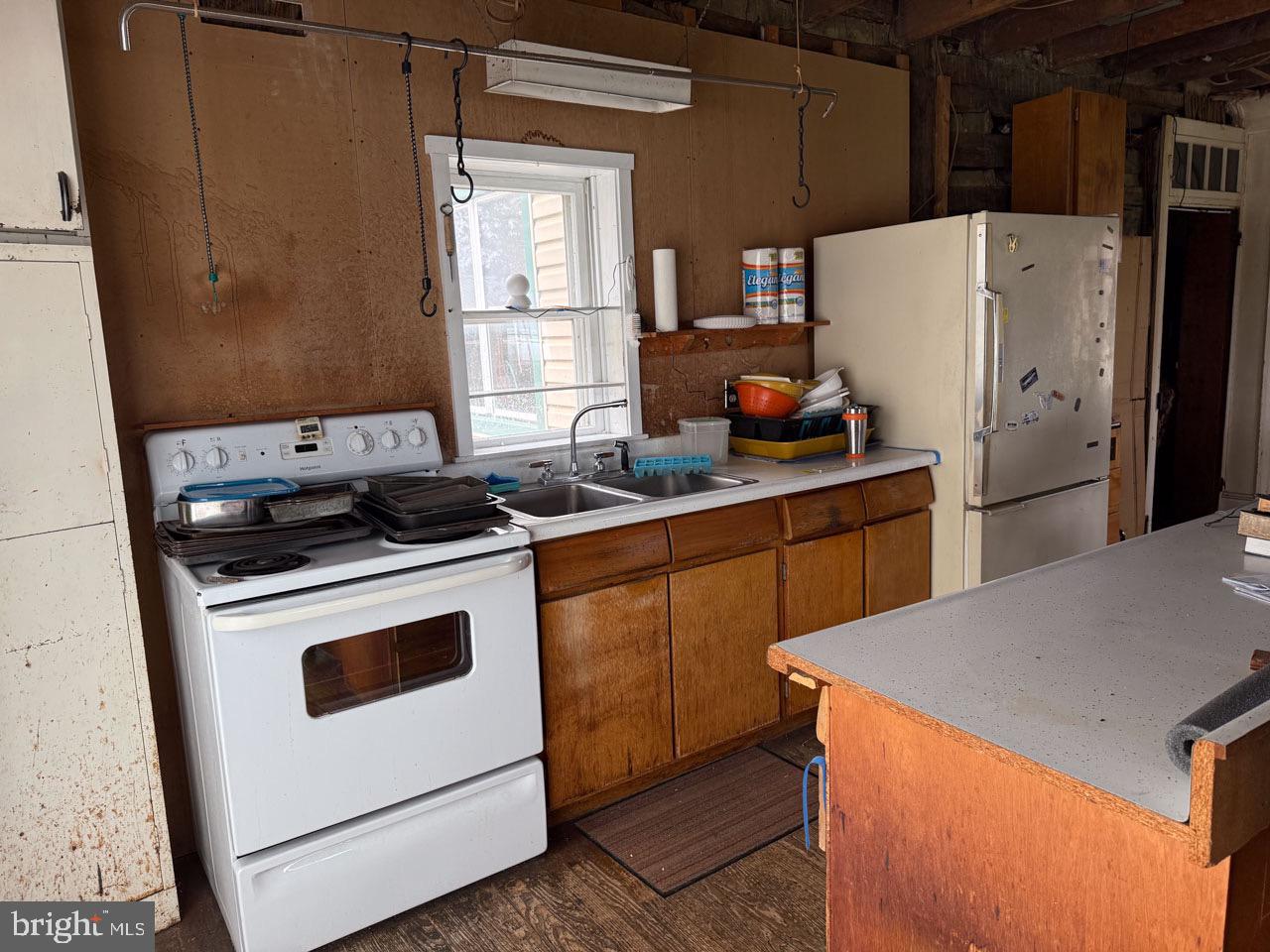 1 Prospect Road Strasburg, PA 17579 - Photo 23 of 66 a kitchen with stainless steel appliances a refrigerator a sink a stove and white cabinets