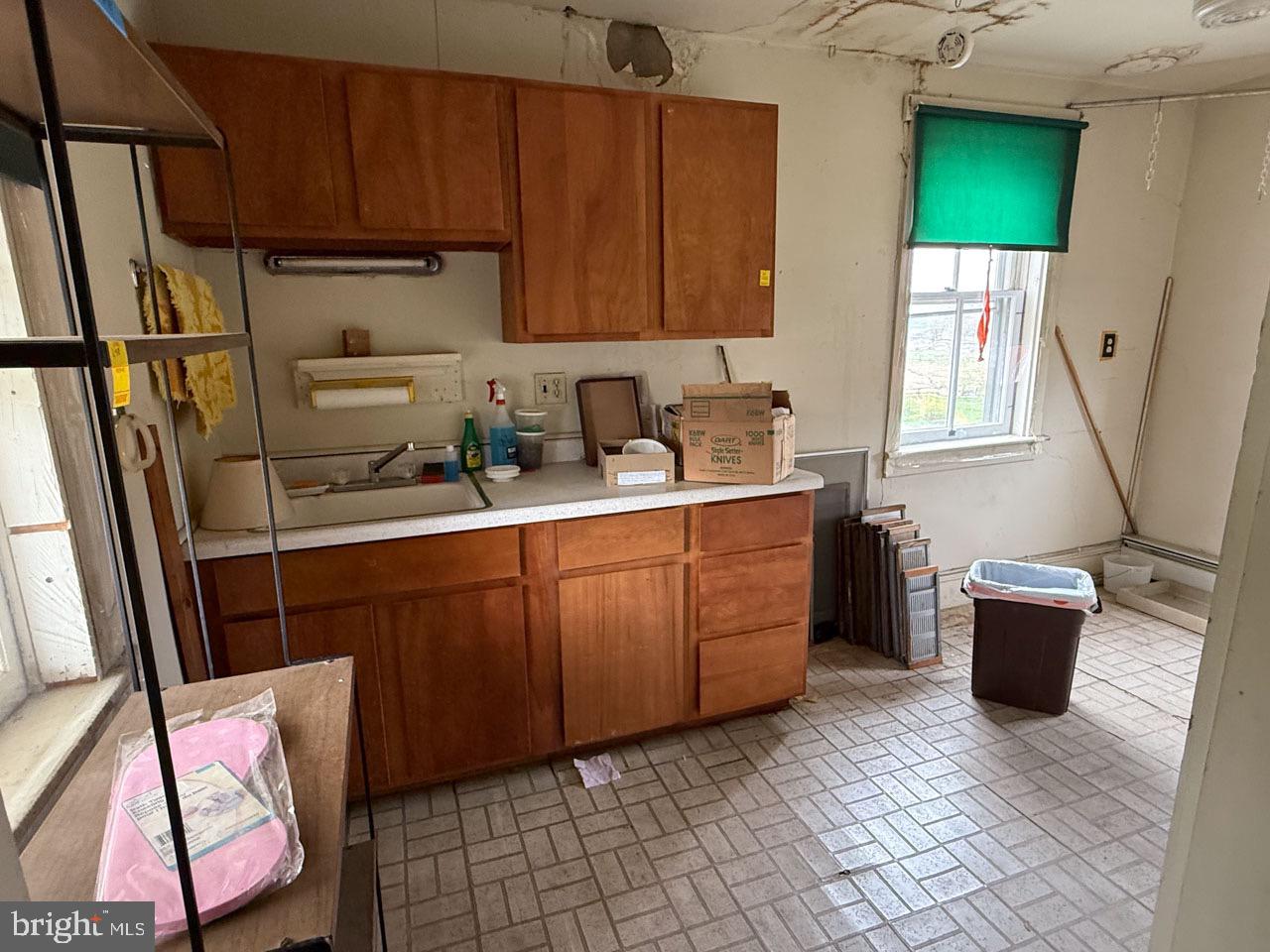 1 Prospect Road Strasburg, PA 17579 - Photo 37 of 66 a kitchen with stainless steel appliances a sink a stove a refrigerator cabinets and a window