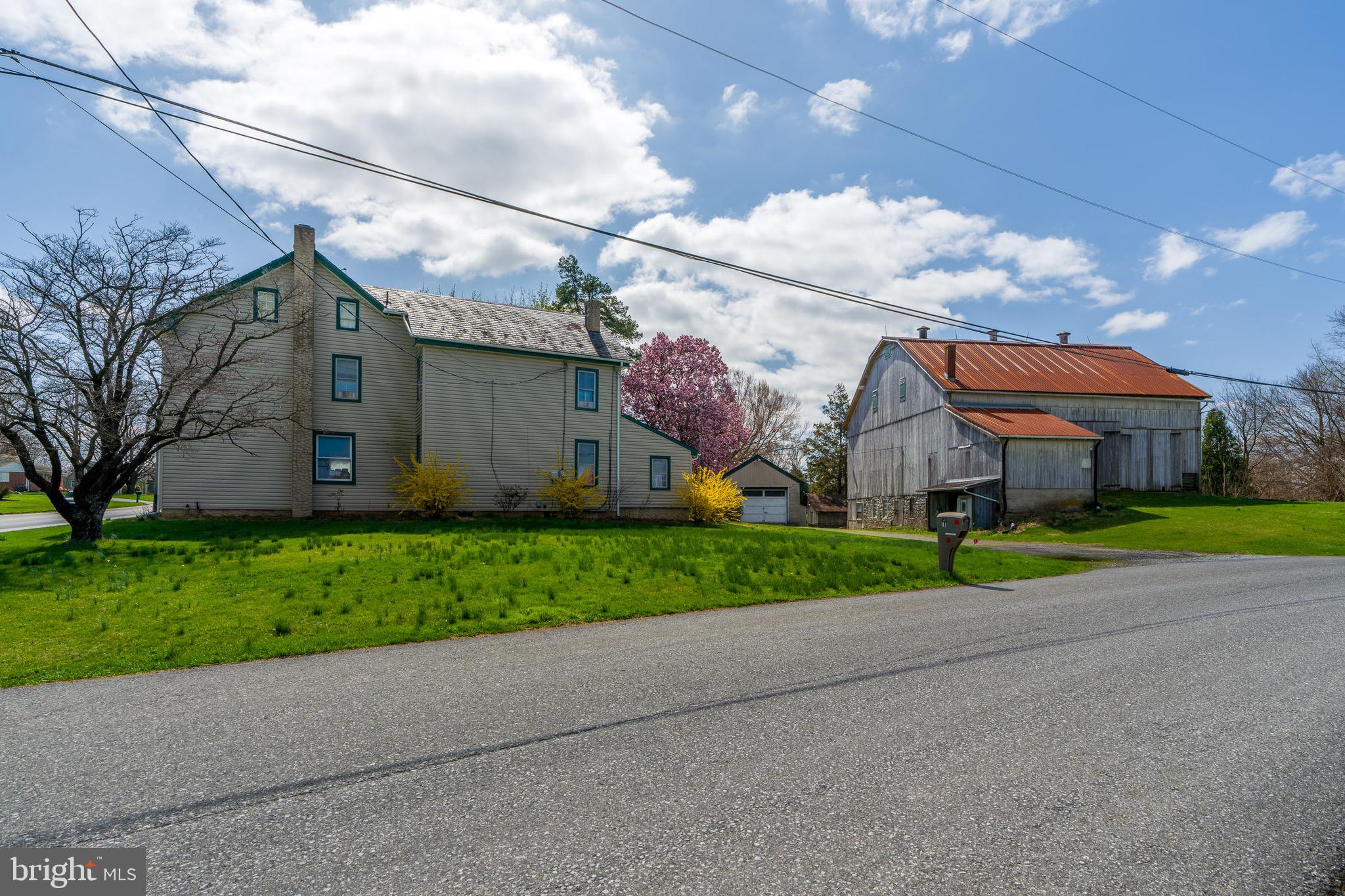 1 Prospect Road Strasburg, PA 17579 - Photo 40 of 66 a view of a house with a big yard and large tree