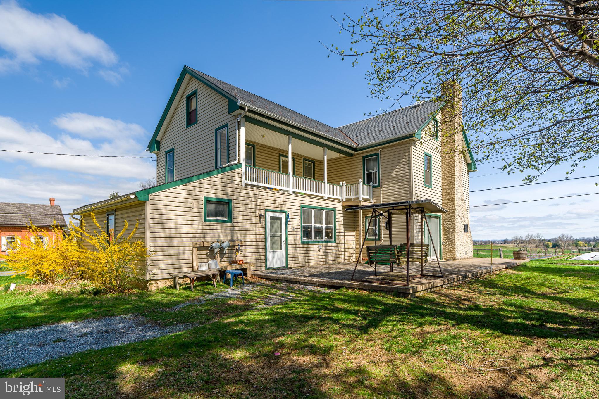 1 Prospect Road Strasburg, PA 17579 - Photo 4 of 66 a front view of a house with a yard