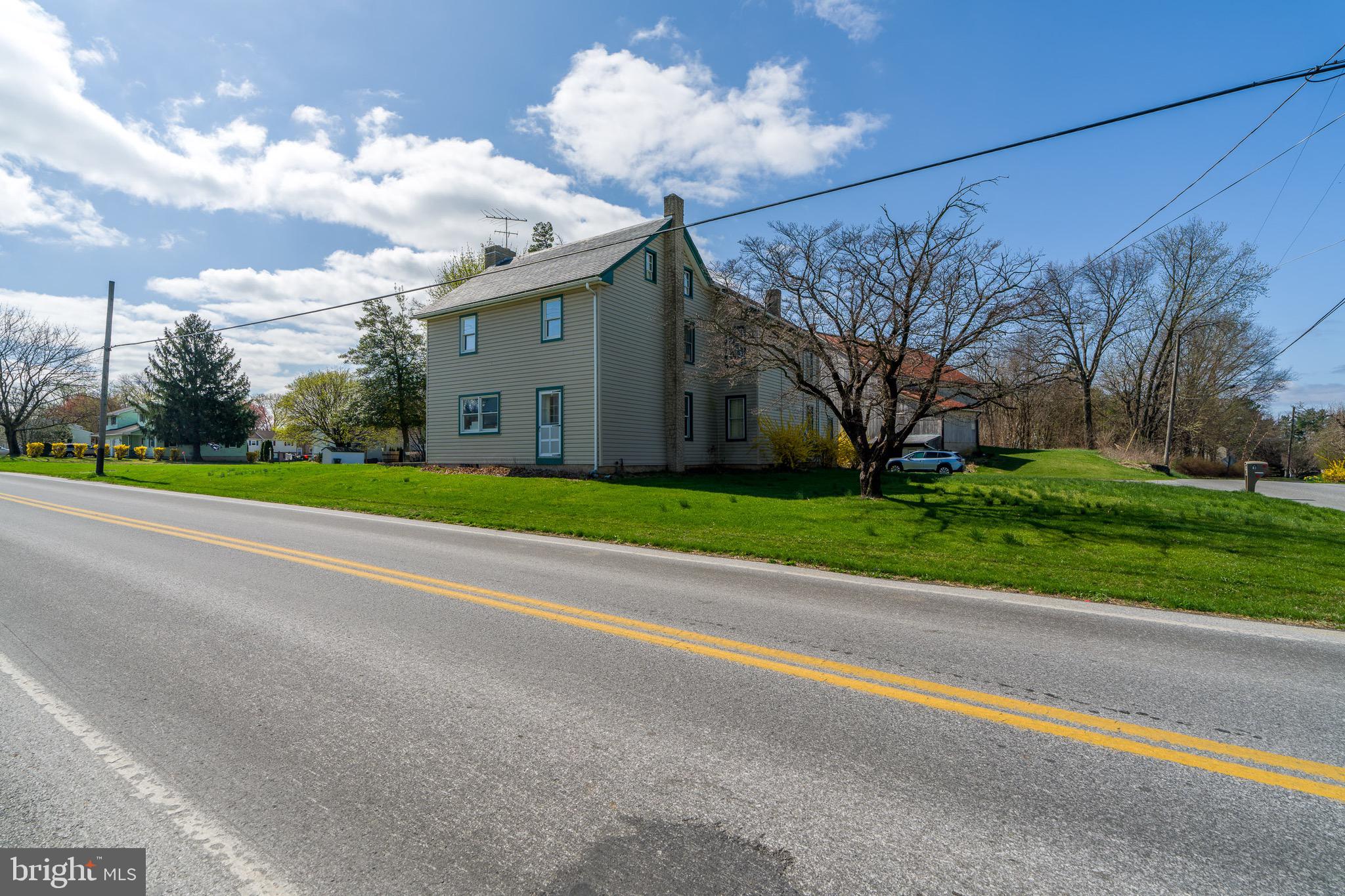1 Prospect Road Strasburg, PA 17579 - Photo 44 of 66 a view of a house with a big yard and large trees