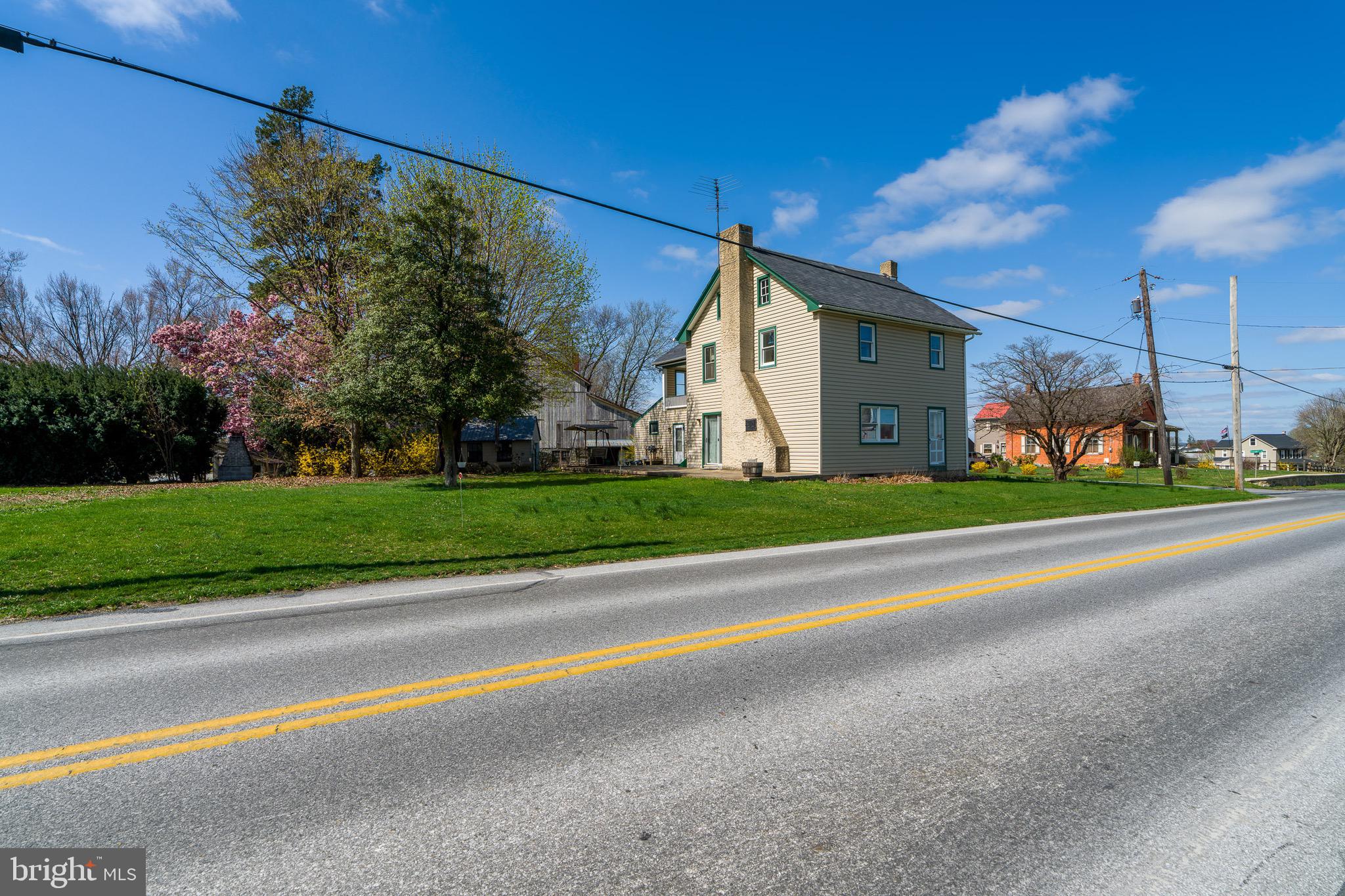 1 Prospect Road Strasburg, PA 17579 - Photo 7 of 66 a view of a house with a yard and plants