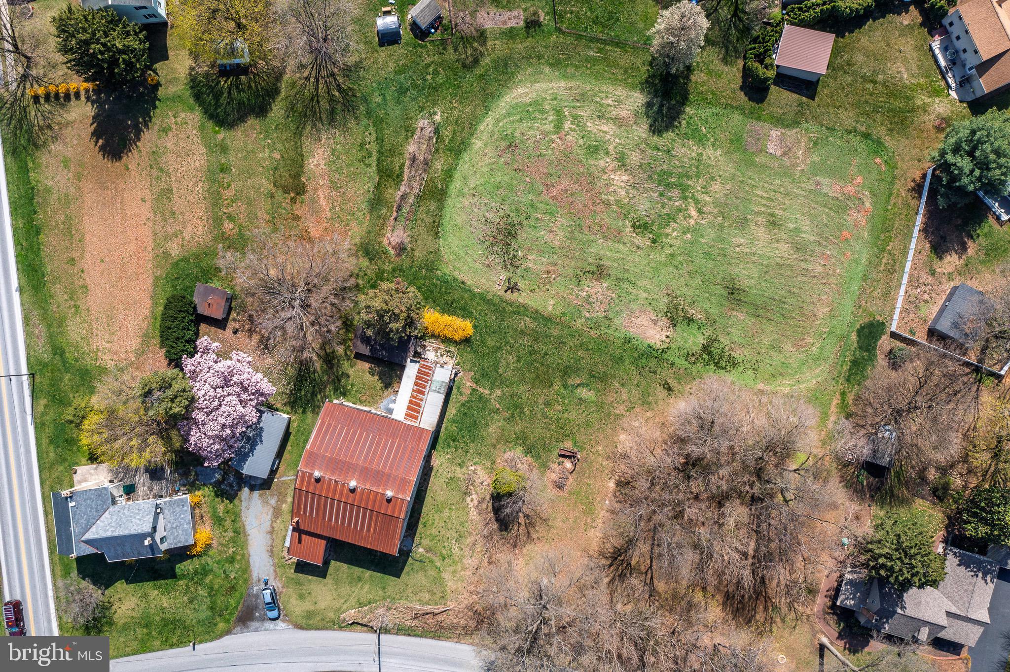 1 Prospect Road Strasburg, PA 17579 - Photo 10 of 66 an aerial view of a house with garden space and street view