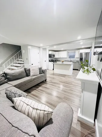 a living room with furniture and a couch