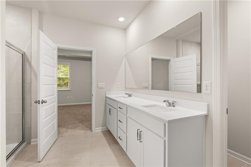 1171 Kingston Road Buckhead, GA 30625 - Photo 19 of 34 a bathroom with a sink and a mirror