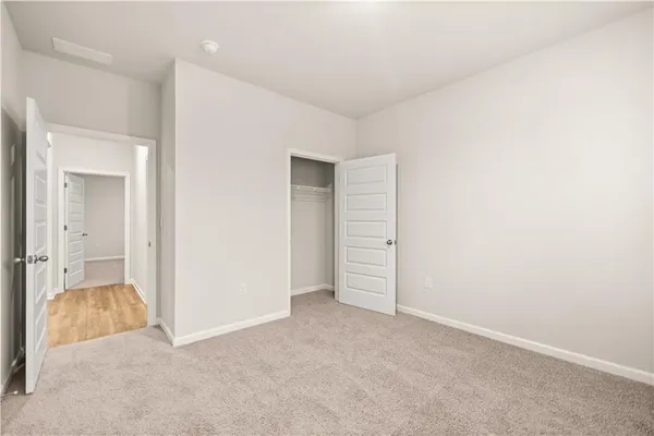 an empty room with closet