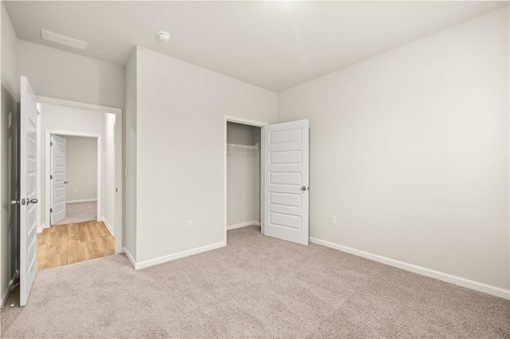 1171 Kingston Road Buckhead, GA 30625 - Photo 22 of 34 an empty room with closet