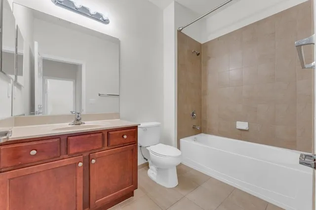 a view of empty room with white walls