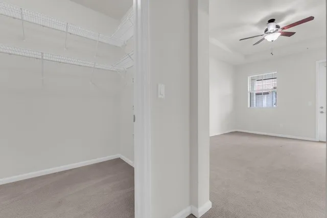 a view of a livingroom from a hallway