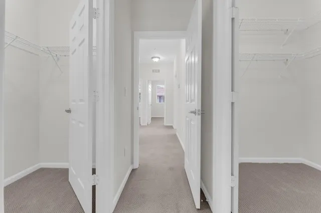 a view of a room with racks on the wall